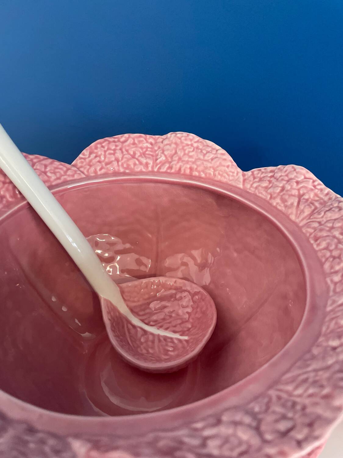 Soup tureen and bowl set with pink cabbage slip