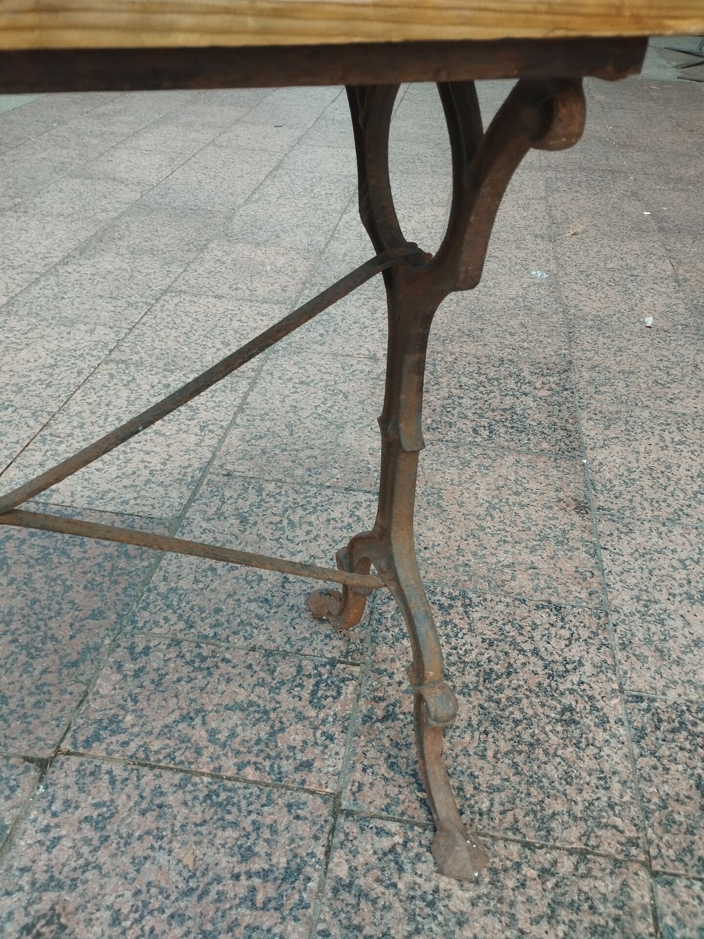 Old bistro table with a wooden top