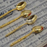 Set of 4 vintage golden spoons
