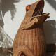 Wicker frog magazine rack by Olivier Cajan