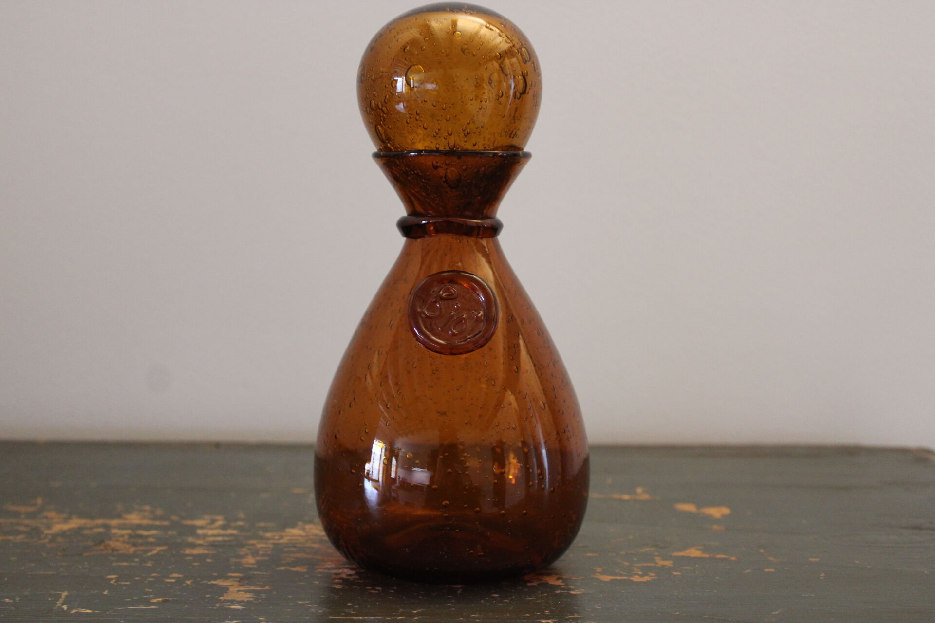 Biot decanter in blown glass bubbled orange hue