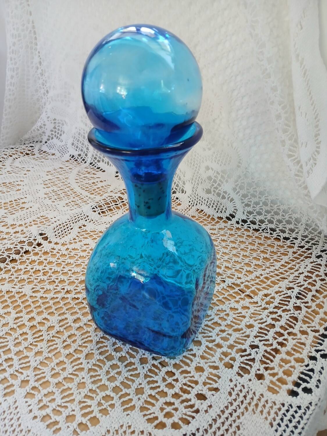 Blue embossed glass carafe
