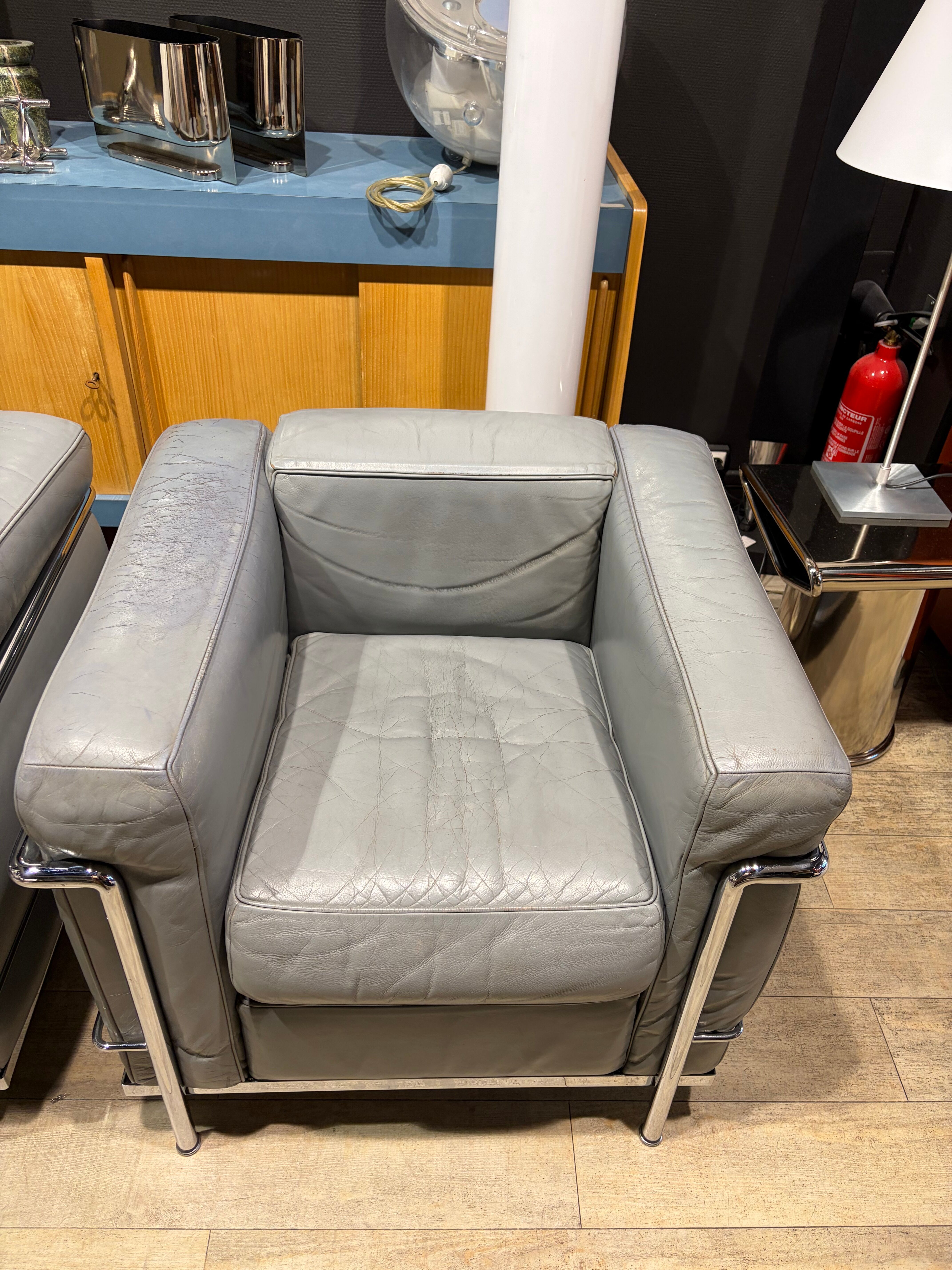 Pair of Cassina LC2 armchairs in grey leather.