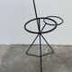 Black metal tripod plant holder