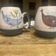 Set of two ceramic mugs signed Yvon ROY.