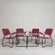 Set of 4 armchairs and a coffee table with tubular structure in Bauhaus style, 1950s.