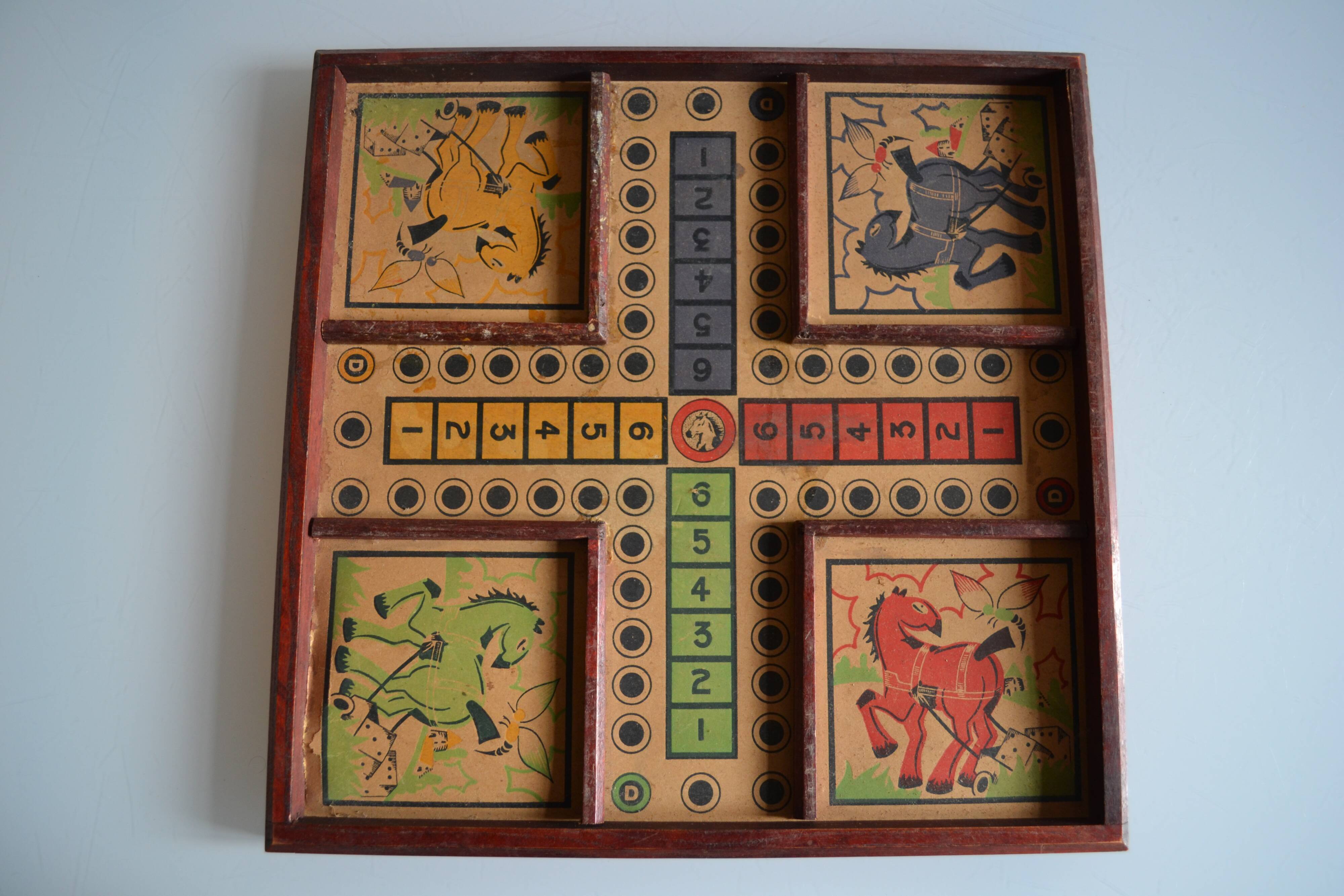 Old game board of small horses