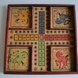 Old game board of small horses