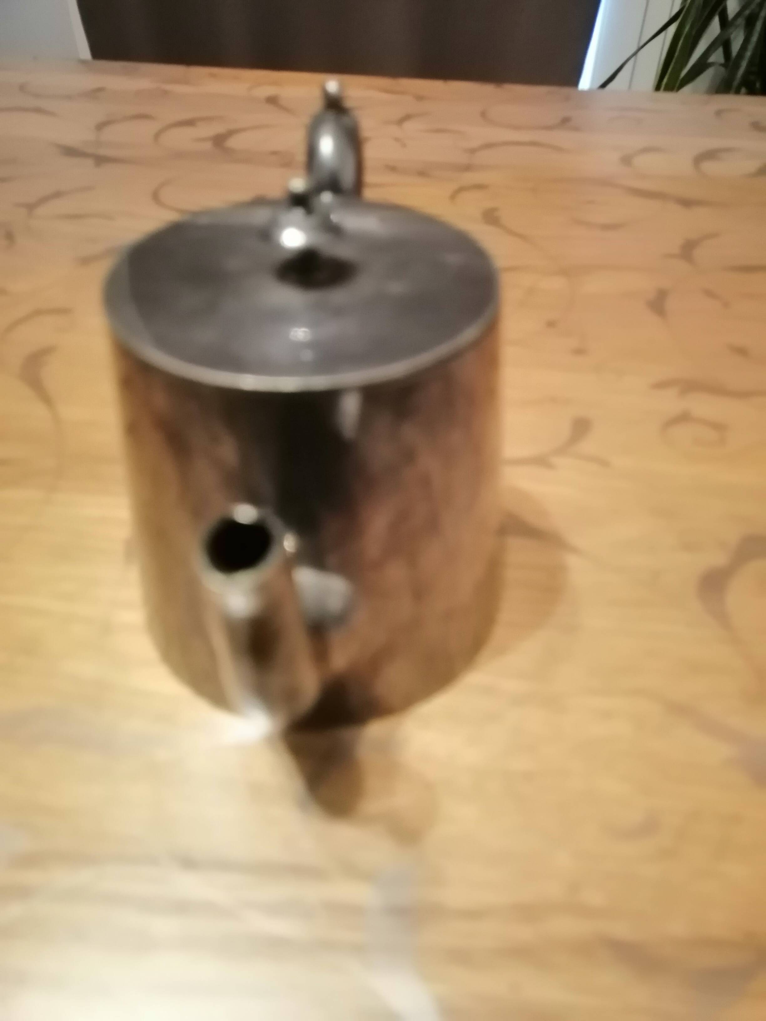 small silver-plated teapot