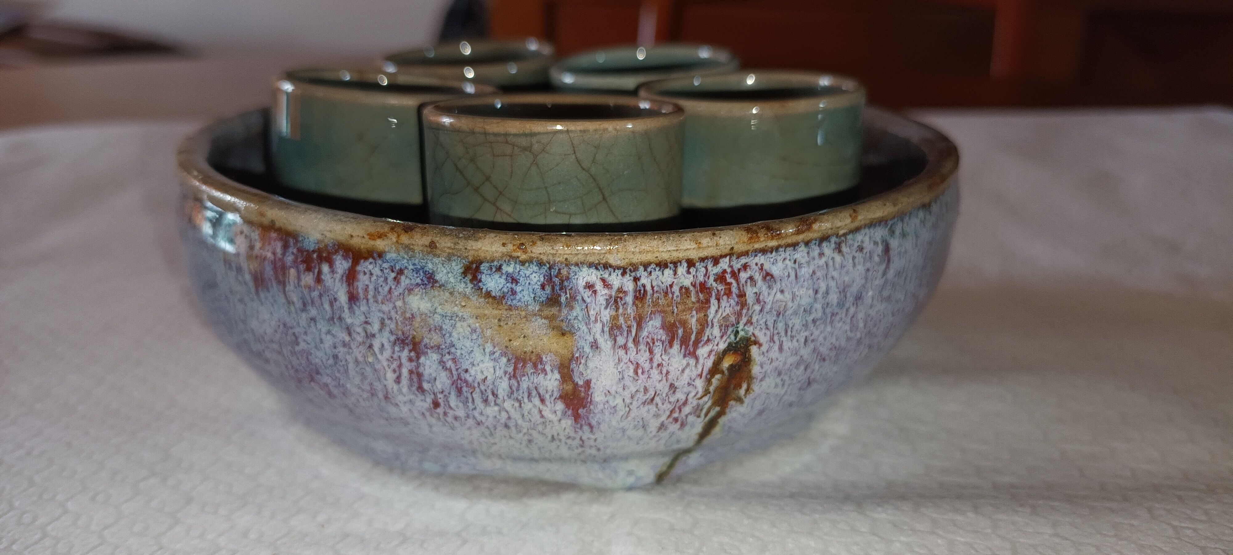 Sandstone bowl with 5 shot glasses