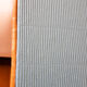Blue rattan shelf