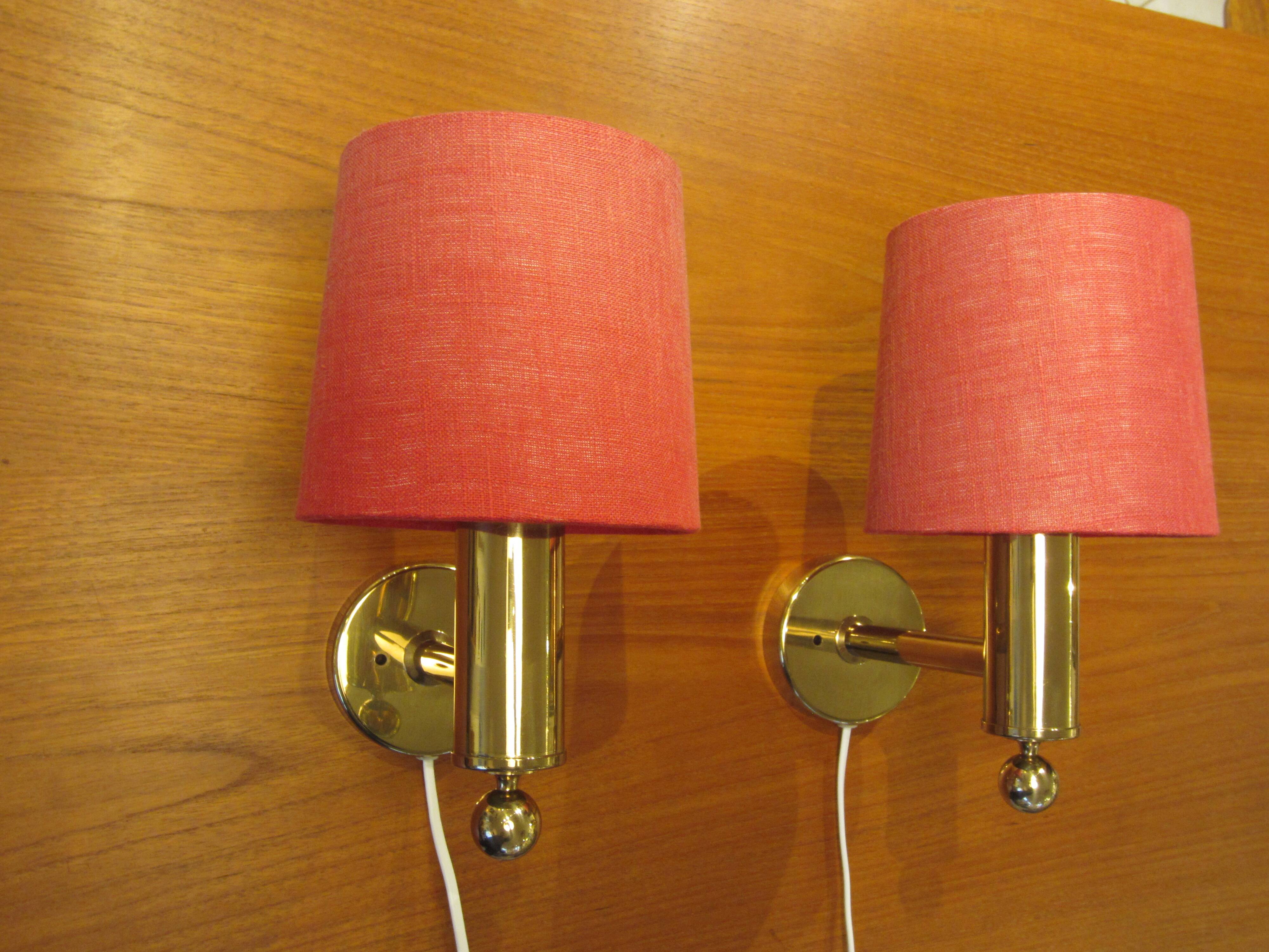 Pair of golden Scandinavian wall lights by Bergboms