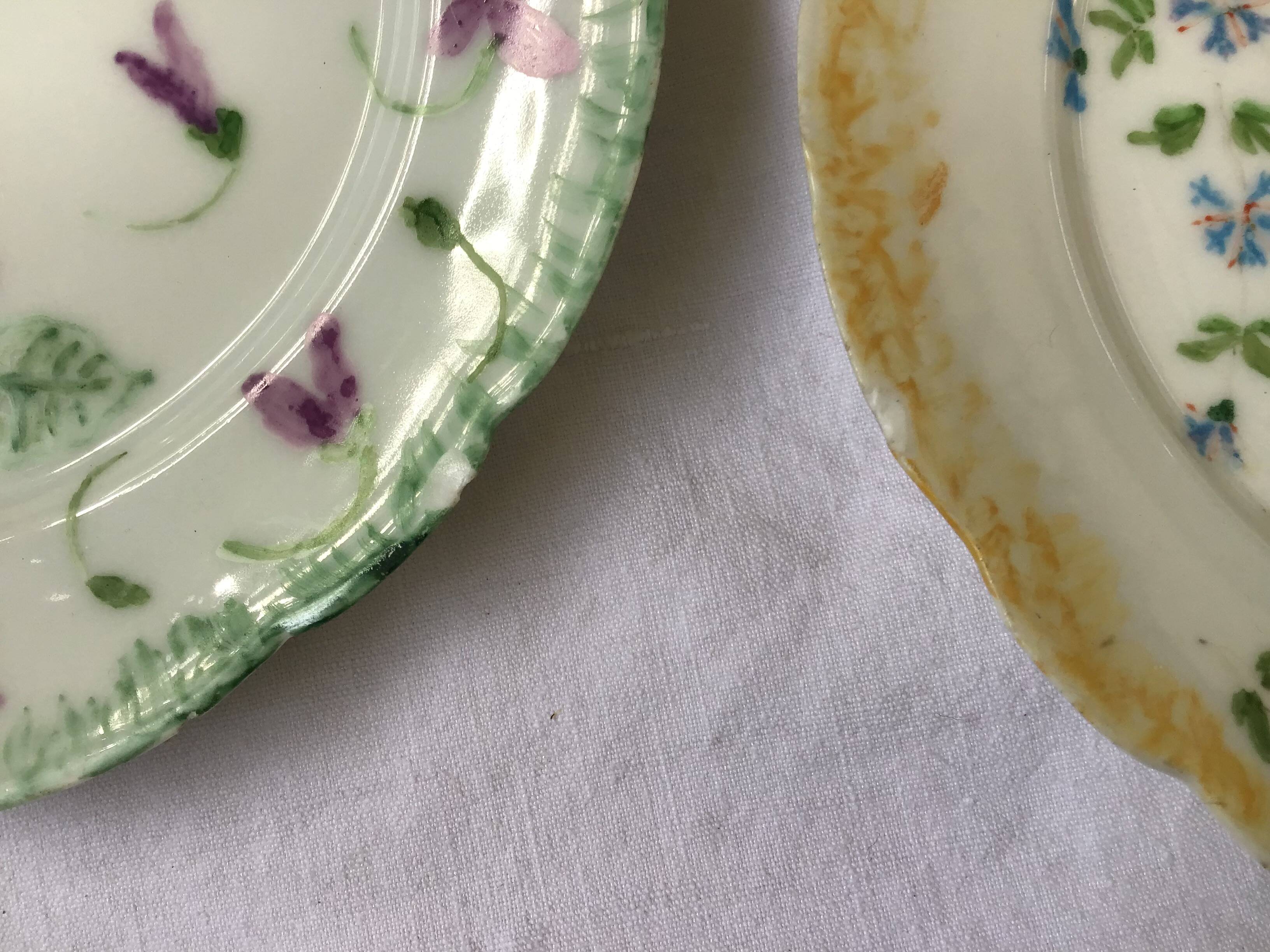 7 small plates in fine Limoges porcelain