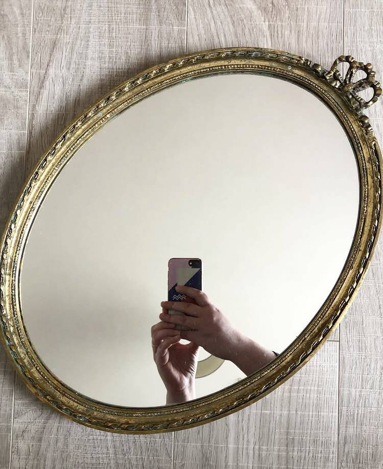 Large vintage oval mirror