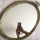 Large vintage oval mirror