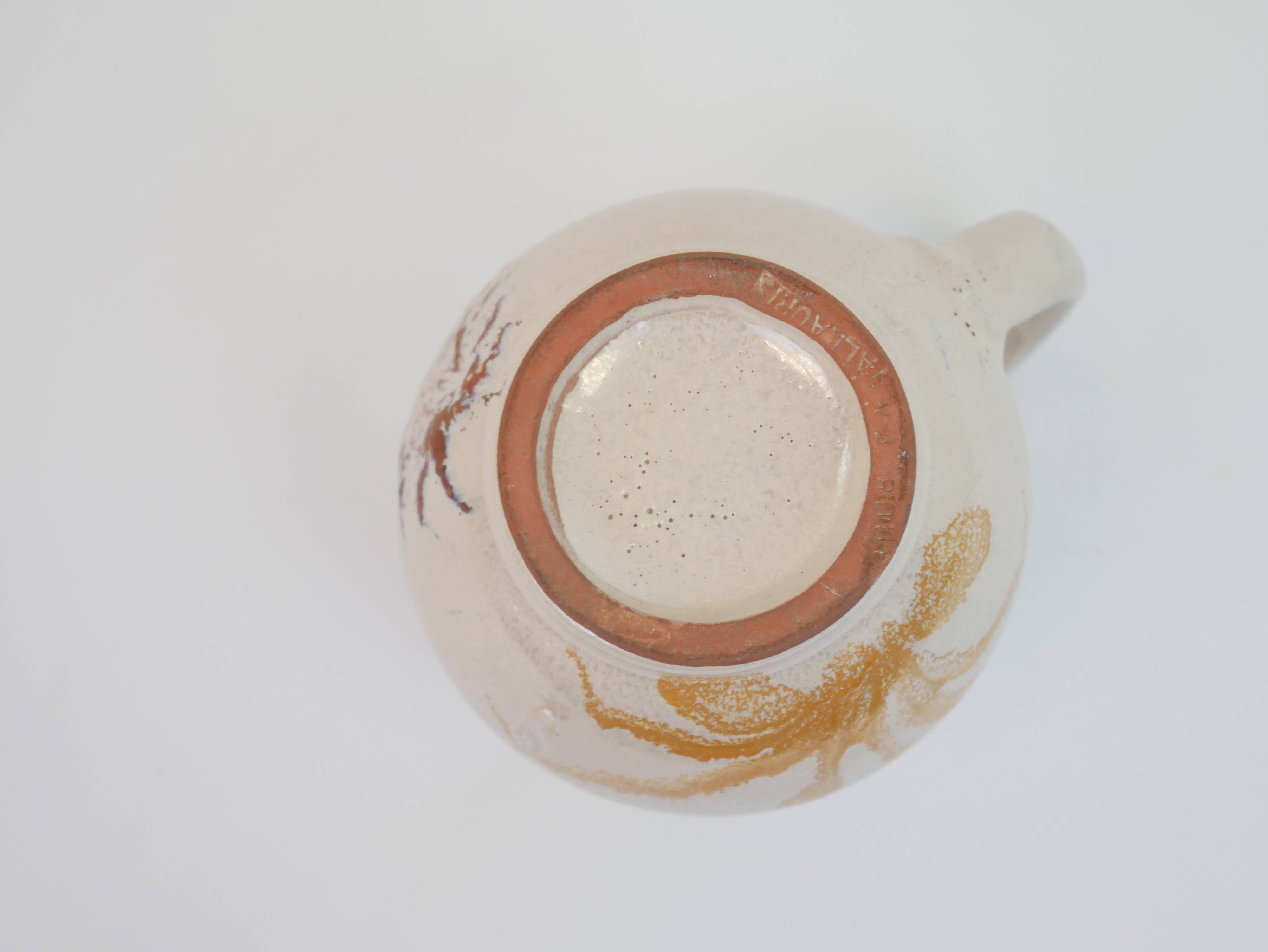 Pair of ceramic milk jugs signed La Roue Vallauris