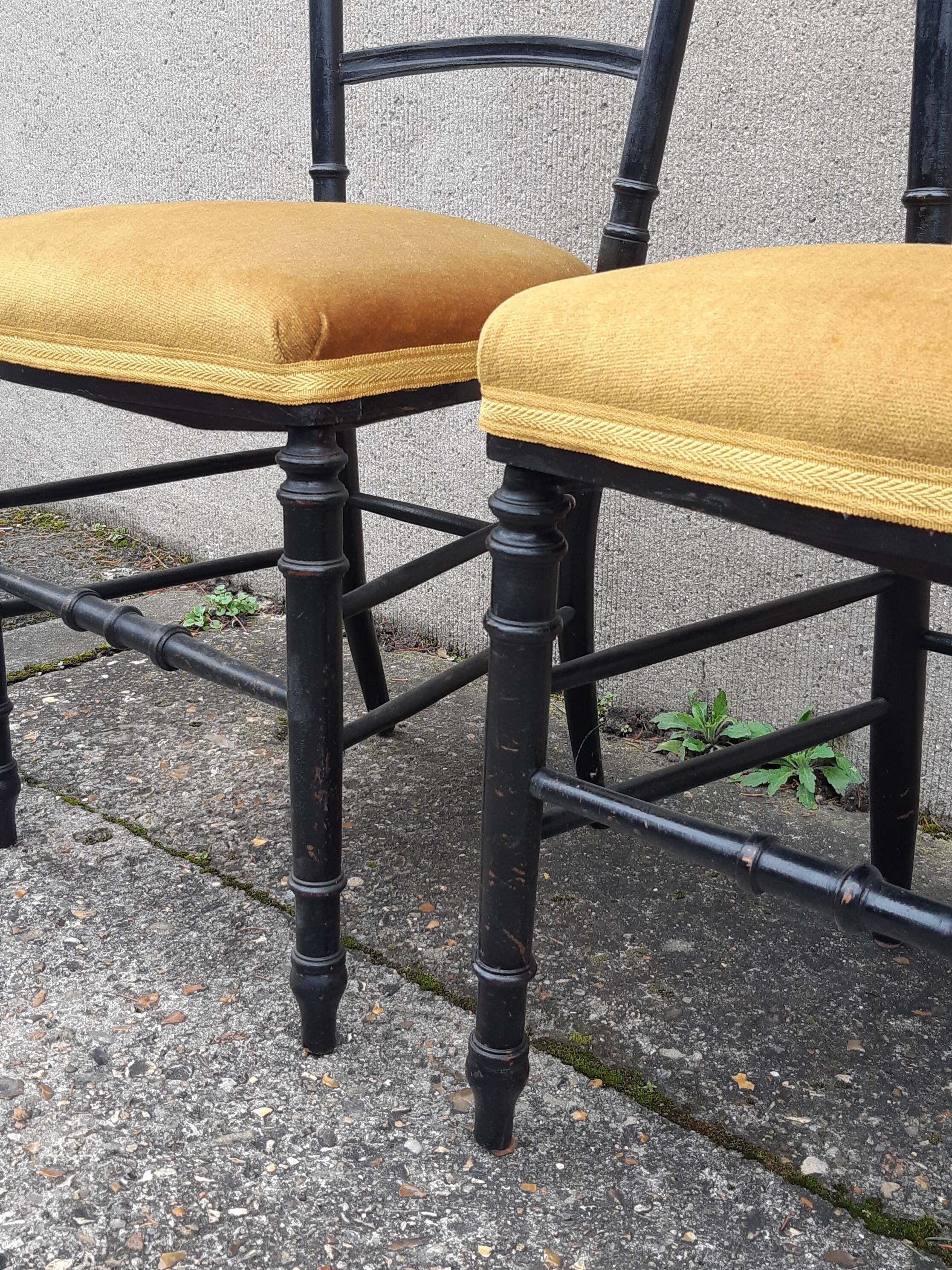 Pair of blackened wood Napoleon III chairs