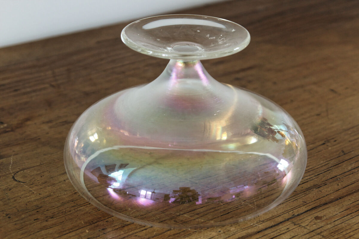 Old iridescent glass cup