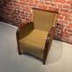 Fauteuil en rotin marron et doré