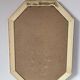 Golden octagonal mirror with bevelled glass from the 1970s.