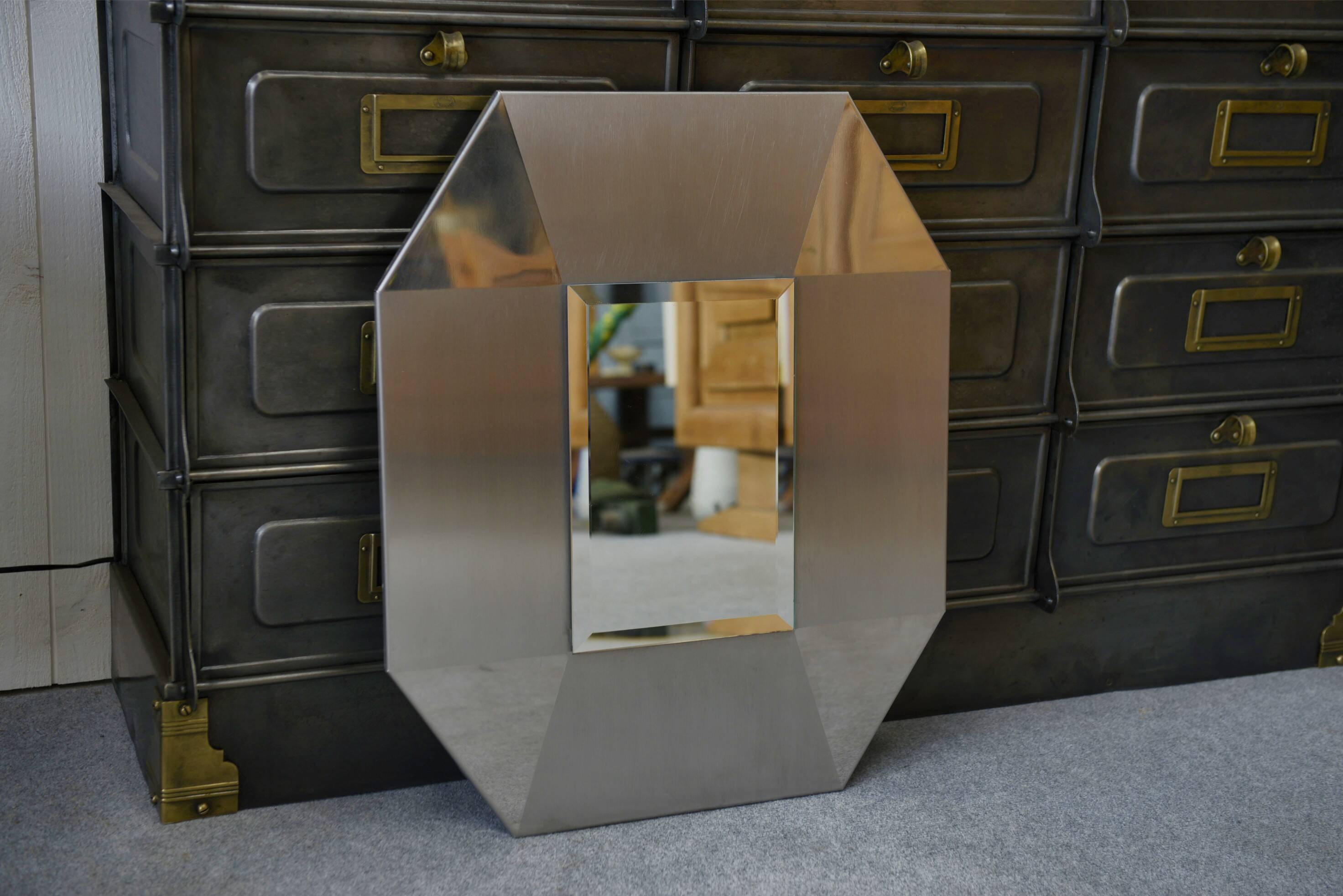 Designer mirror in brushed and chrome-plated stainless steel, beveled glass, 1970s