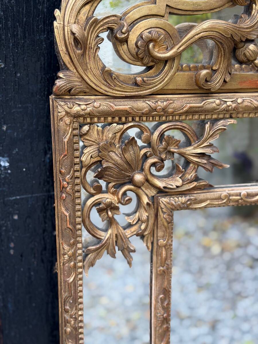 Regency style mirror in gilded wood, 19th century