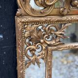 Regency style mirror in gilded wood, 19th century