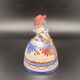 Trio of ceramic bell figurines