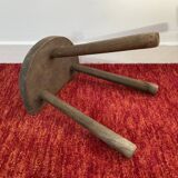 Old wooden tripod stool