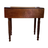 Wooden table with extensions