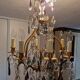 Brass cage chandelier and crystal pendants with 8 lights and 79 pendants