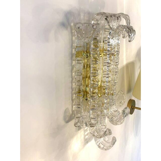 Contemporary transparent "lingue" murano glass wall lamp in barovier style