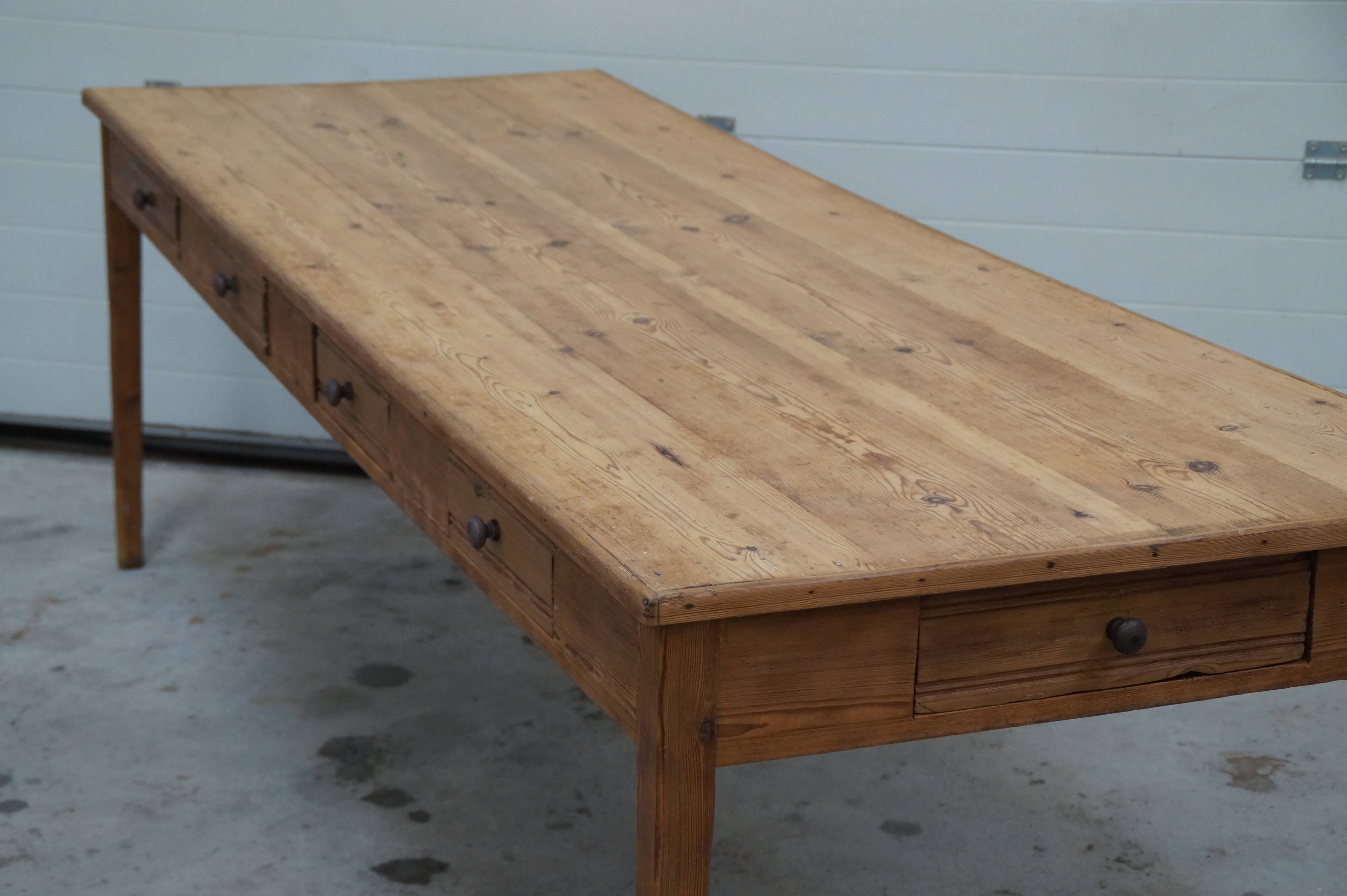 Old canteen in pine table