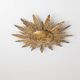 Mid-century sun ceiling lamp in gilded metal with leaf rays, 1950s