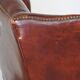 Large comfortable sheepleather wingchair in good condition and beautiful colours