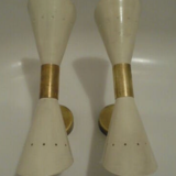 Pair of wall sconces remembering the Italian creations from the 50s and 60's