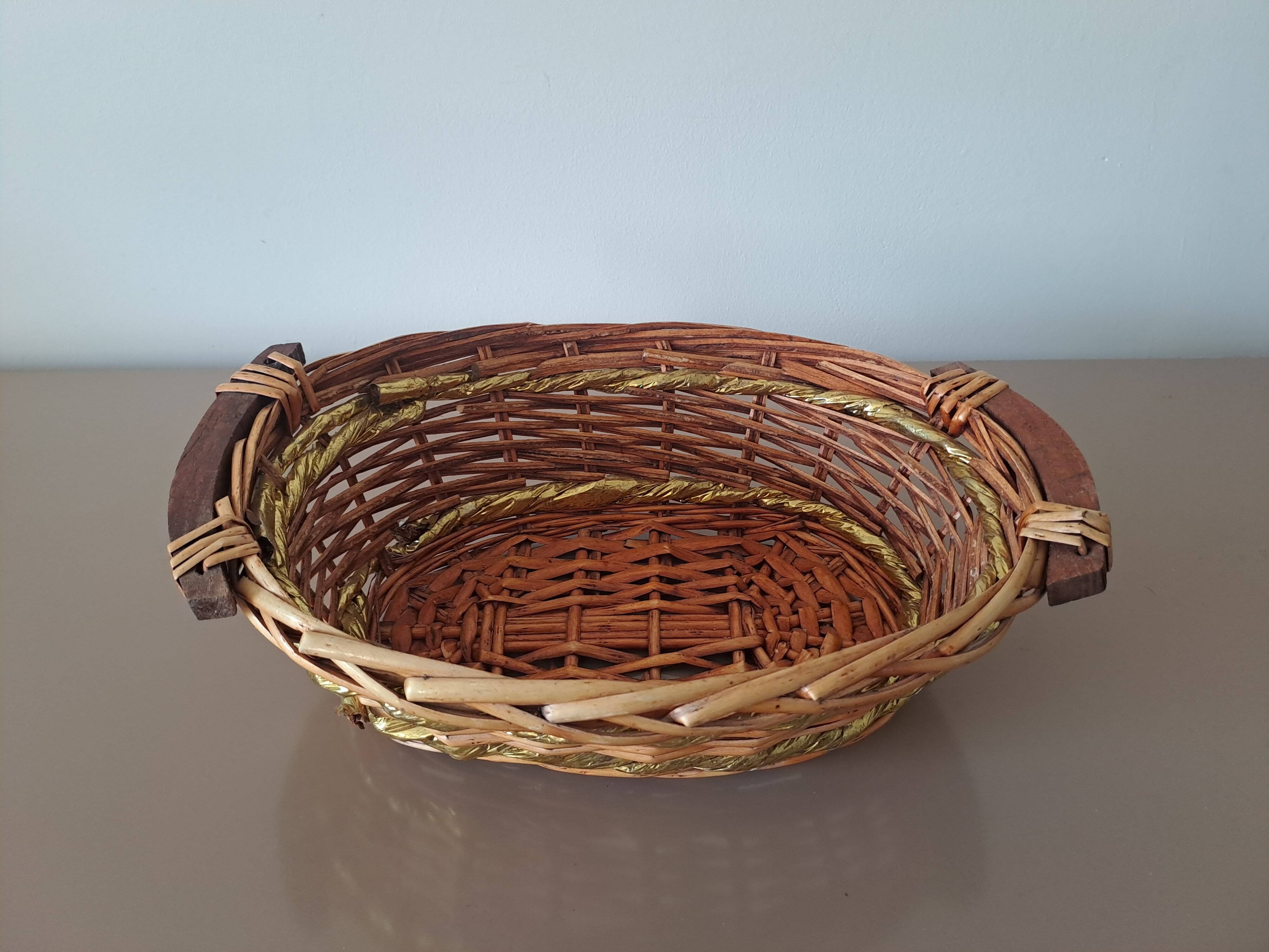 Vintage round woven wicker basket with wooden handles