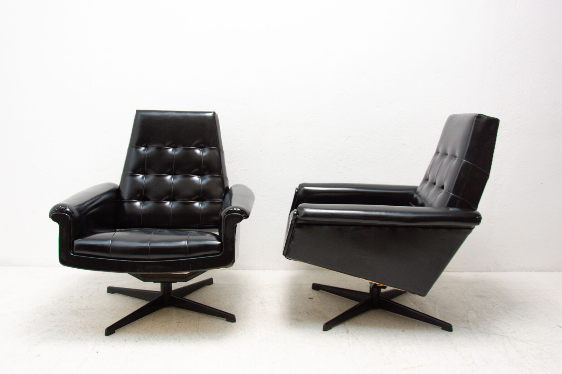 Pair of leather swivel armchairs from UP Zavody, 1970´s