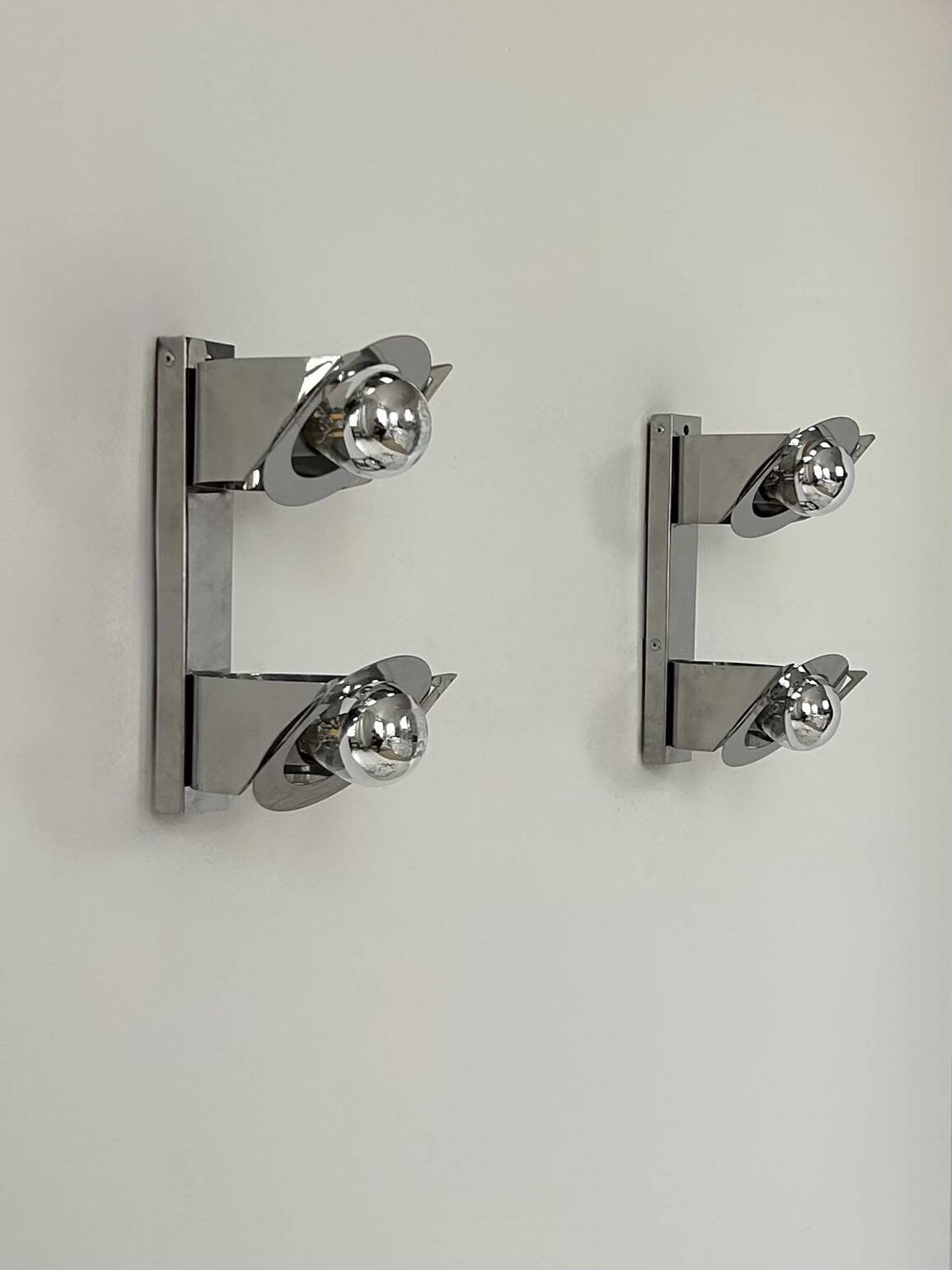 Pair of vintage wall lights, chrome metal, France, 1970.