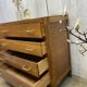 Commode aux pieds compas
