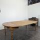 Louis Philippe table with extensions in cherry wood.