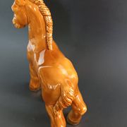Ceramic horse sculpture with wild glaze and gold, signed Art Deco.
