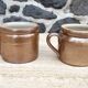Duo of sandstone pots with handle