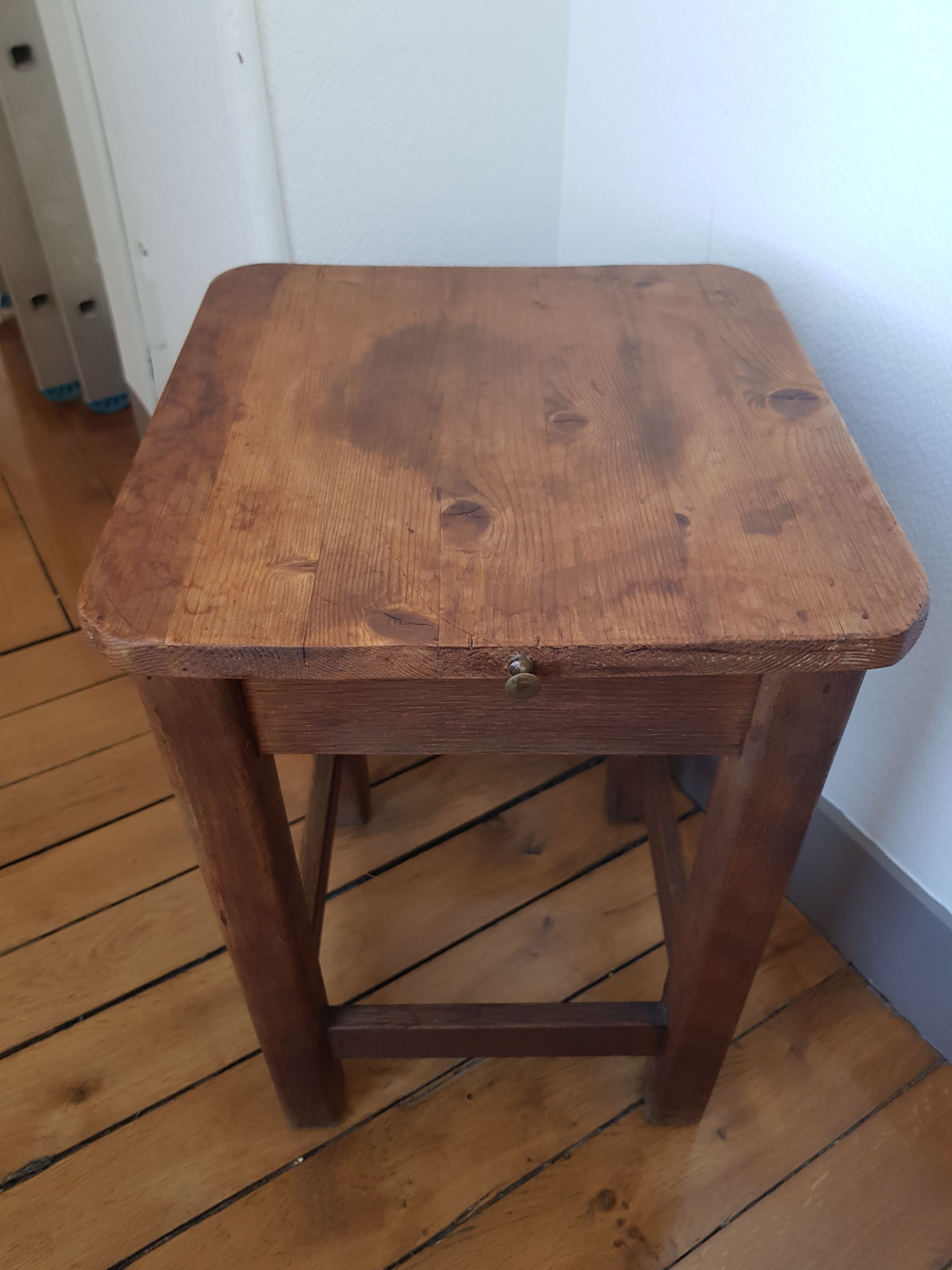 Wooden stool with chest