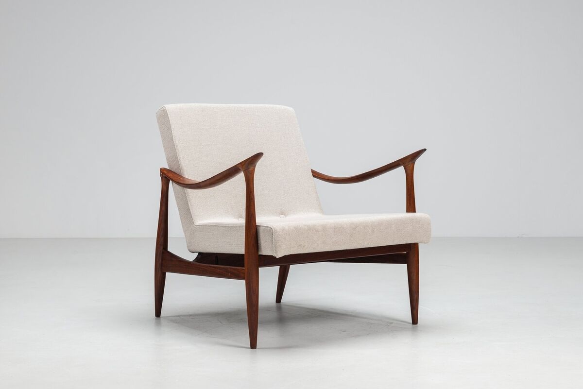 Sculptural Danish lounge chair in teak and fabric Denmark 1960