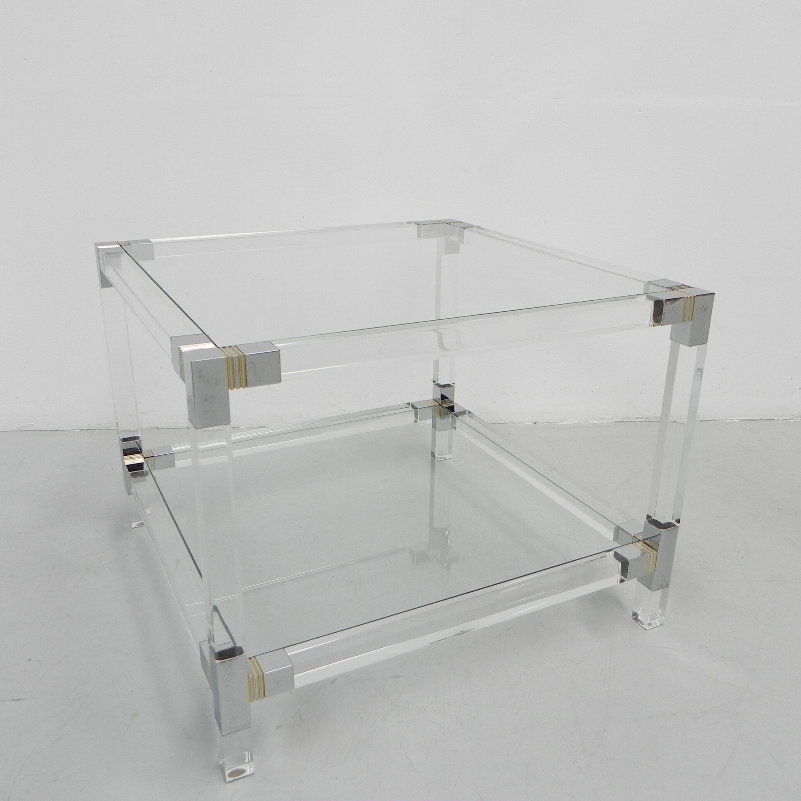 Hollywood Regency coffee table with perspex frame