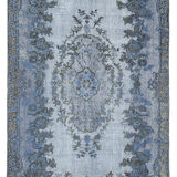 Hand-knotted vintage turkish 1970s 175 cm x 284 cm blue carpet