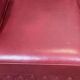 Chesterfield 2-seater leather sofa, modern production from the 2000s.
