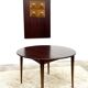Danish round dining table in rosewood – 1950s design with butterfly extension.