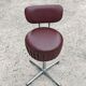 Set of 4 Mid Century Modern swivel chairs in tubular steel and leather.